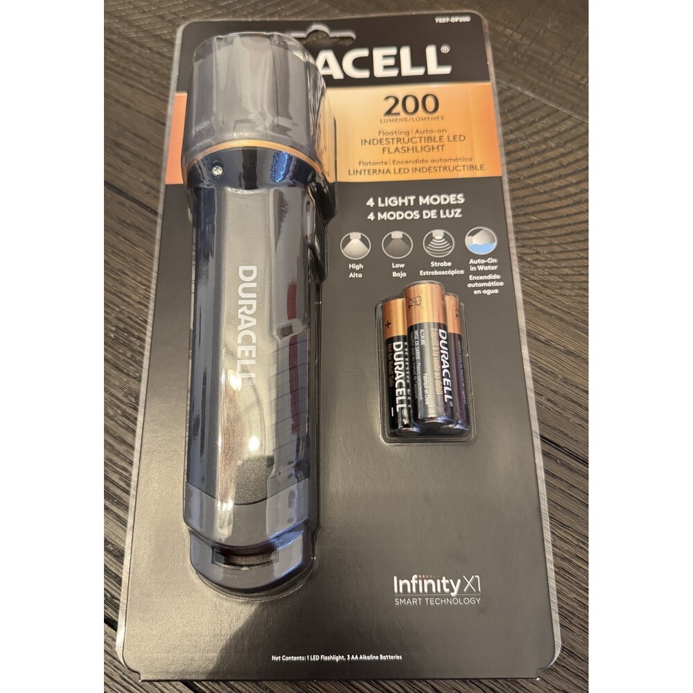 New Duracell 200 Lumens Indestructible LED Flashlight & Batteries Sealed